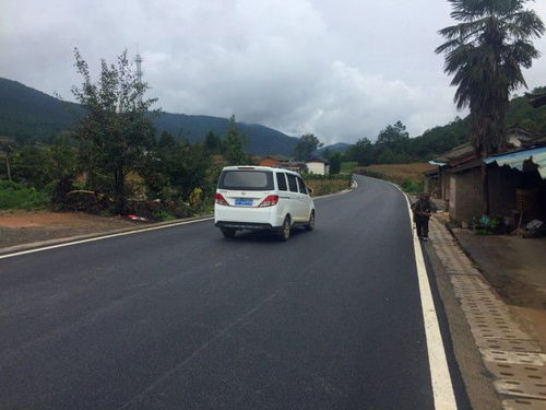 214國(guó)道麗江段改建工程基本完工 全線二級(jí)路面 設(shè)計(jì)時(shí)速60公里